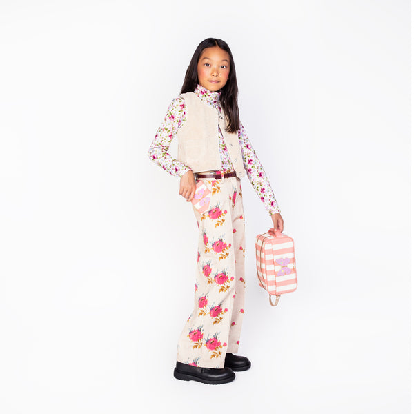 The Travel Pouch by Jeune Premier is a compact, stylish accessory with two zippers for easy organization. It’s the perfect travel companion!