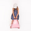 Jeune Premier City Bag Blush carried as a tote bag, reinforced handle