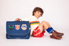 Boy wearing Jeune Premier It Bag Midi Supercats school bag, age 6 to 8