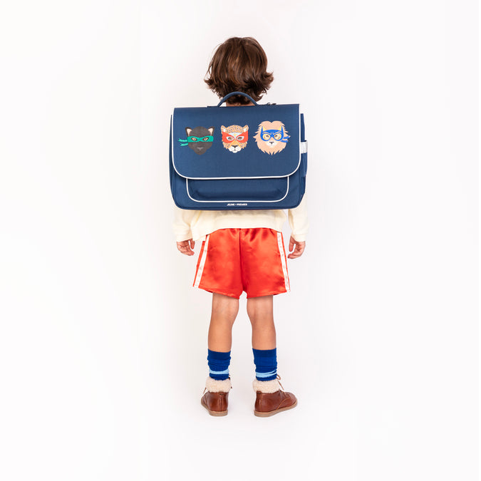Boy wearing Jeune Premier It Bag Midi Supercats school bag, age 6 to 8