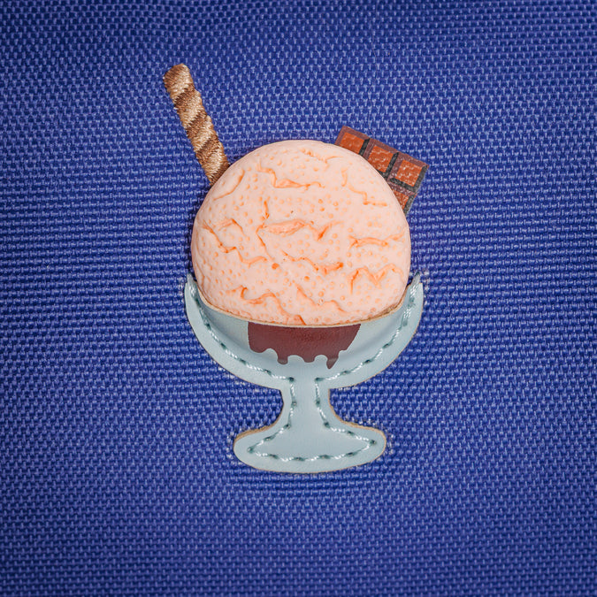 Dark blue Ergomaxx Disco Dip ergonomic backpack by Jeune Premier with colorful ice cream illustrations for girls from first grade